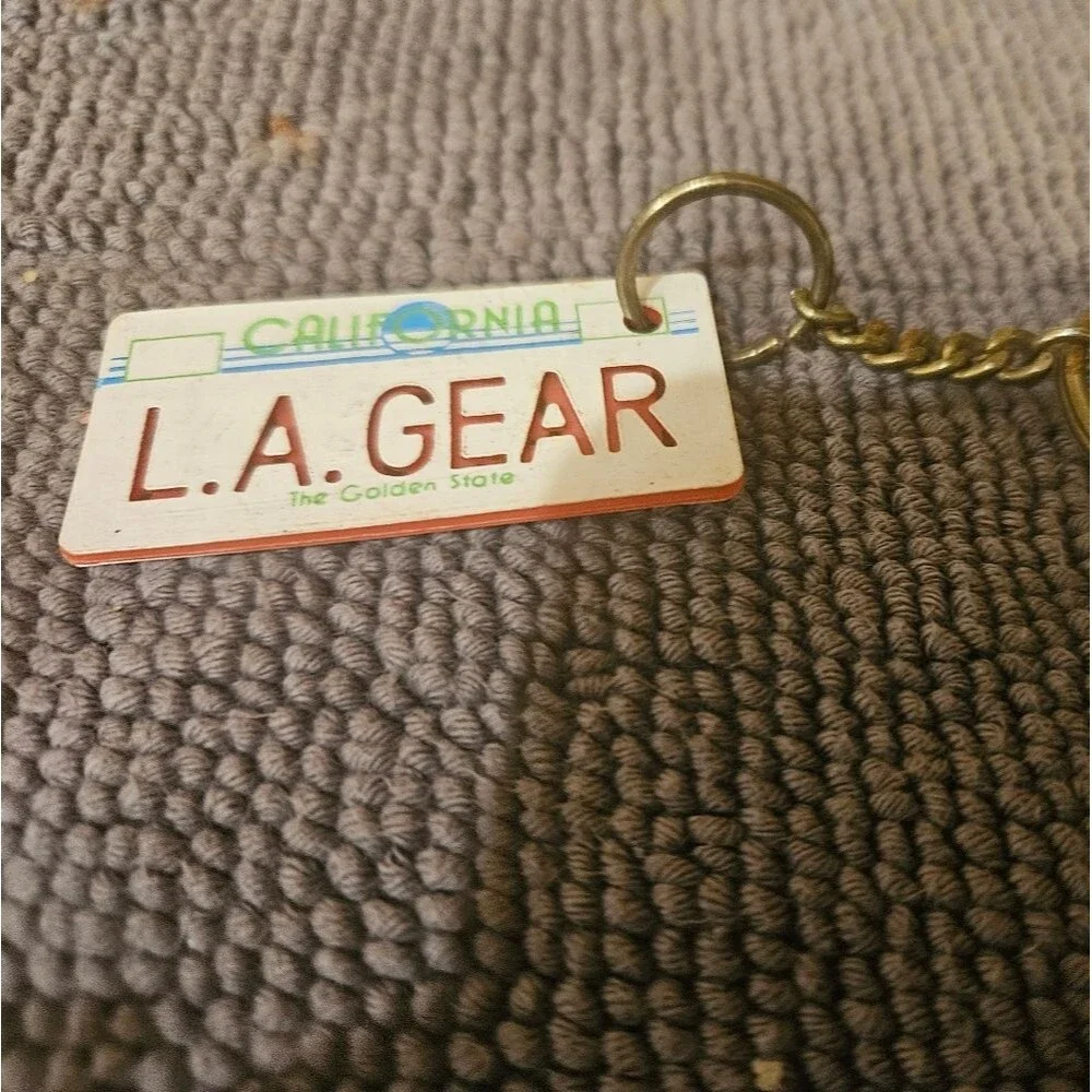 1980's L.A. Gear California license plate keychain tag